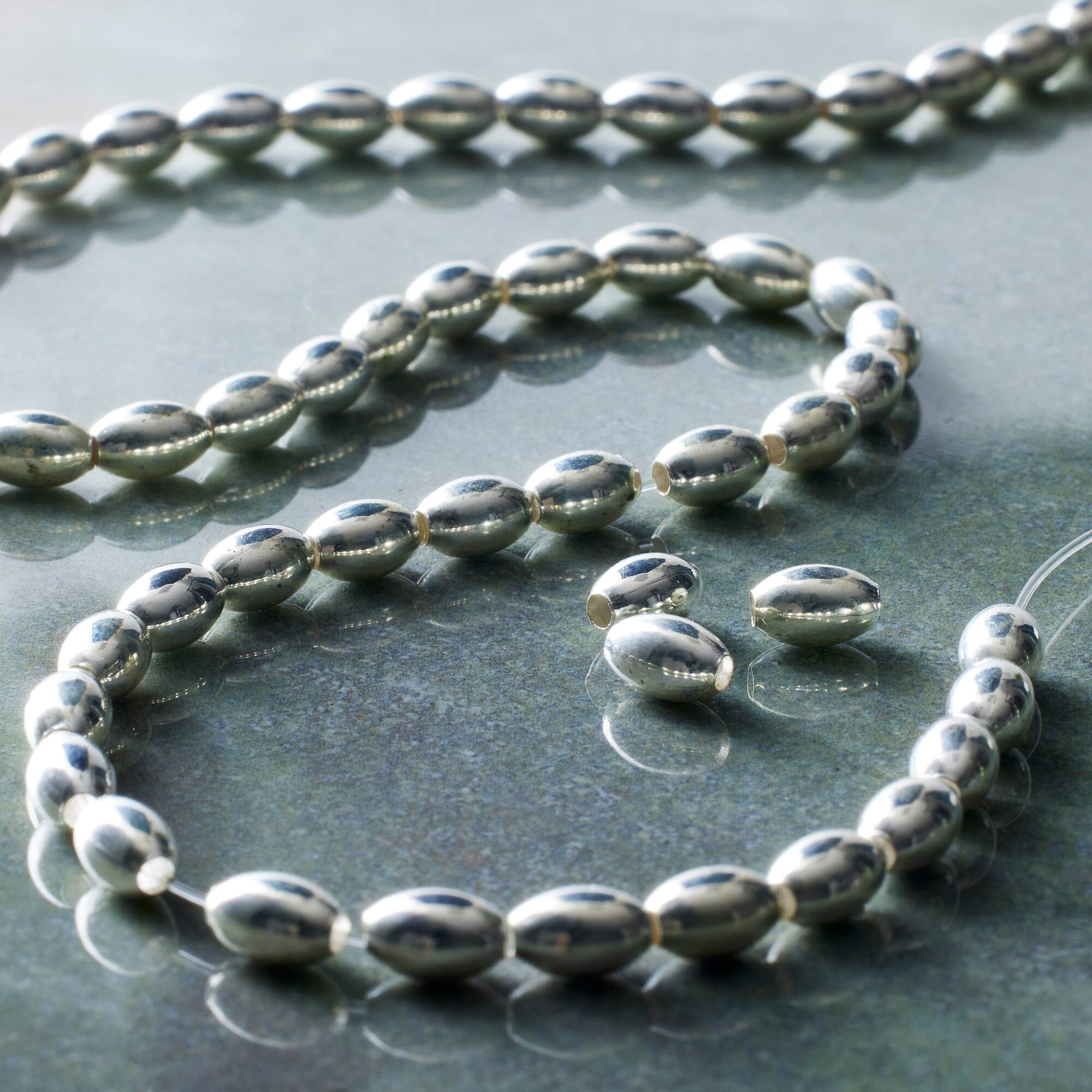 Silver Metal Small Oval Beads, 6mm by Bead Landing™